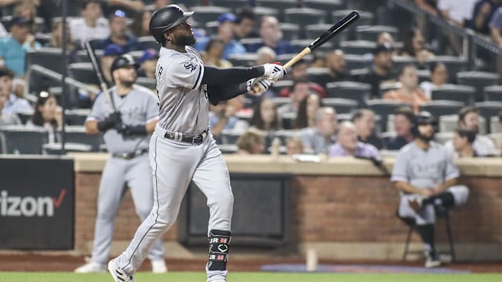 Jul 19, 2023; New York City, New York, USA;  Chicago White Sox center fielder Luis Robert Jr. (88) hits a solo home run in the seventh inning against the New York Mets at Citi Field. Mandatory Credit: Wendell Cruz-Imagn Images