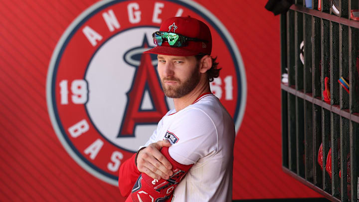 Sep 29, 2024; Anaheim, California, USA;  Los Angeles Angels left fielder Taylor Ward (3) stands in a dugout during the ninth inning against the Texas Rangers at Angel Stadium. Mandatory Credit: Kiyoshi Mio-Imagn Images