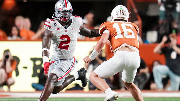 Ohio State Buckeyes defensive end Kenyatta Jackson Jr. (2) pursues Texas Longhorns quarterback Arch Manning (16) during the NCAA football game at Darrell K Royal–Texas Memorial Stadium in Austin, Texas on Sept. 12, 2026. Ohio State Buckeyes defensive end Kenyatta Jackson Jr. (2) pursues Texas Longhorns quarterback Arch Manning (16) during the NCAA football game at Darrell K Royal–Texas Memorial Stadium in Austin, Texas on Sept. 12, 2026.