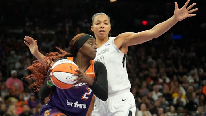Phoenix Mercury guard Kahleah Copper (2) looks to pass around Las Vegas Aces center Kiah Stokes (41) during the fourth quarter at Footprint Center in Phoenix on Sunday, Sept. 1, 2024.
