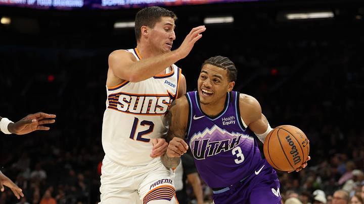 Oct 16, 2026; Phoenix, Arizona, USA; Utah Jazz guard Keyonte George (3) dribbles against Phoenix Suns guard Collin Gillespie (12) in the first half at Mortgage Matchup Center. Mandatory Credit: Anna Carrington-Imagn Images Oct 16, 2026; Phoenix, Arizona, USA; Utah Jazz guard Keyonte George (3) dribbles against Phoenix Suns guard Collin Gillespie (12) in the first half at Mortgage Matchup Center. Mandatory Credit: Anna Carrington-Imagn Images