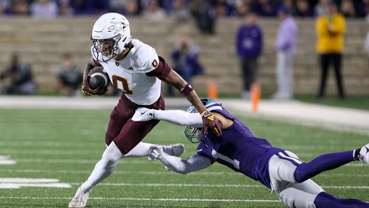 Nov 16, 2024; Manhattan, Kansas, USA; Arizona State Sun Devils wide receiver Jordyn Tyson (0) tries break free from Kansas State Wildcats cornerback Keenan Garber (1) during the first quarter at Bill Snyder Family Football Stadium. Mandatory Credit: Scott Sewell-Imagn Images Nov 16, 2024; Manhattan, Kansas, USA; Arizona State Sun Devils wide receiver Jordyn Tyson (0) tries break free from Kansas State Wildcats cornerback Keenan Garber (1) during the first quarter at Bill Snyder Family Football Stadium. Mandatory Credit: Scott Sewell-Imagn Images
