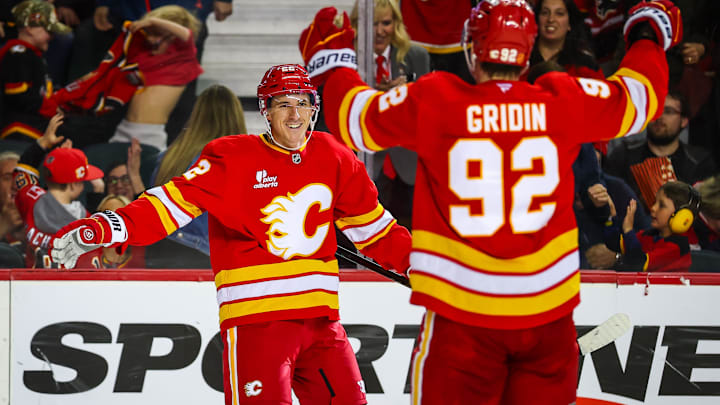 Mar 22, 2026; Calgary, Alberta, CAN; Calgary Flames center Ryan Strome (22) celebrates his goal against the Tampa Bay Lightning during the overtime period at Scotiabank Saddledome. Mandatory Credit: Sergei Belski-Imagn Images