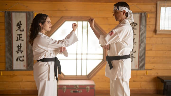 Cobra Kai. (L to R) Mary Mouser as Samantha LaRusso, Ralph Macchio as Daniel LaRusso in Cobra Kai. Cr. Curtis Bonds Baker/Netflix © 2024