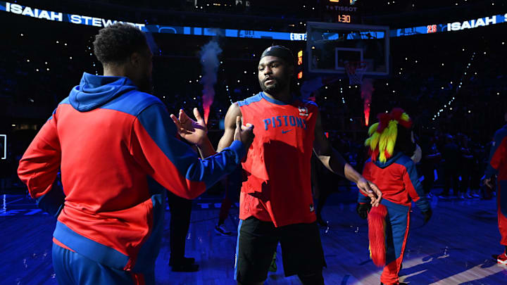 Apr 5, 2025; Detroit, Michigan, USA;  Detroit Pistons center Isaiah Stewart (right) and guard Malik Beasley do a special handshake during payer introductions before their game against the Memphis Grizzlies at Little Caesars Arena. Mandatory Credit: Lon Horwedel-Imagn Images