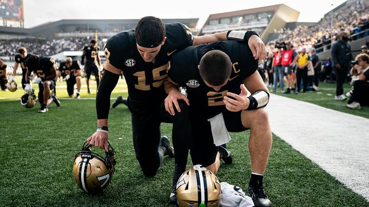 Vanderbilt quarterback Blaze Berlowitz (19) and quarterback Diego Pavia (2) take a moment before their game against Kentucky at FirstBank Stadium in Nashville, Tenn., Saturday, Nov. 22, 2025. Vanderbilt quarterback Blaze Berlowitz (19) and quarterback Diego Pavia (2) take a moment before their game against Kentucky at FirstBank Stadium in Nashville, Tenn., Saturday, Nov. 22, 2025.