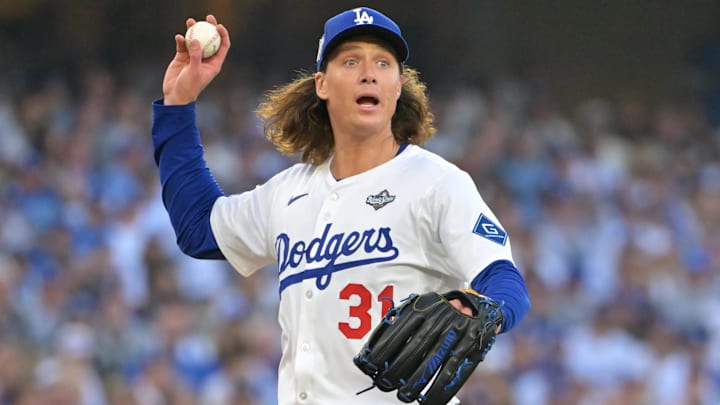 Oct 27, 2025; Los Angeles, California, USA; Los Angeles Dodgers pitcher Tyler Glasnow (31) throws to first for an out against Toronto Blue Jays second baseman Bo Bichette (11) in the second inning during game three of the 2025 MLB World Series at Dodger Stadium. Mandatory Credit: Jayne Kamin-Oncea-Imagn Images