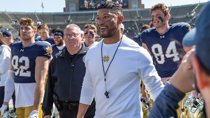 Apr 12, 2025; Notre Dame, IN, USA; Notre Dame Fighting Irish head coach Marcus Freeman smiles as he walks off the field after the Blue-Gold game at Notre Dame Stadium. 