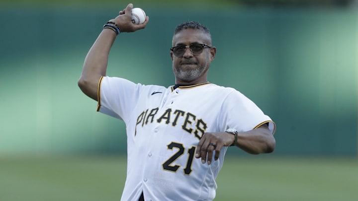 Sep 15, 2023; Pittsburgh, Pennsylvania, USA;  Roberto Clemente Jr son of Pittsburgh Pirates Hall of Fame former right fielder Roberto Clemente (not pictured) throws out an honorary first pitch before the game against the New York Yankees at PNC Park. Mandatory Credit: Charles LeClaire-Imagn Images