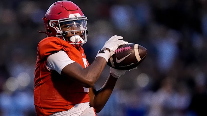 Brentwood Academy's Eli Ferguson (5) receives a pass against Brentwood during the first half at Brentwood Academy in Brentwood, Tenn., Friday, Aug. 30, 2024.