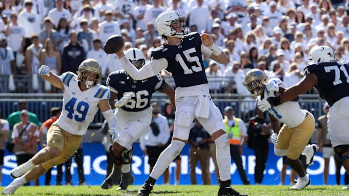 Oct 5, 2024; University Park, Pennsylvania, USA; Penn State Nittany Lions quarterback Drew Allar (15) throws a pass during the fourth quarter against the UCLA Bruins at Beaver Stadium. Mandatory Credit: Matthew O'Haren-Imagn Images Oct 5, 2024; University Park, Pennsylvania, USA; Penn State Nittany Lions quarterback Drew Allar (15) throws a pass during the fourth quarter against the UCLA Bruins at Beaver Stadium. Mandatory Credit: Matthew O'Haren-Imagn Images