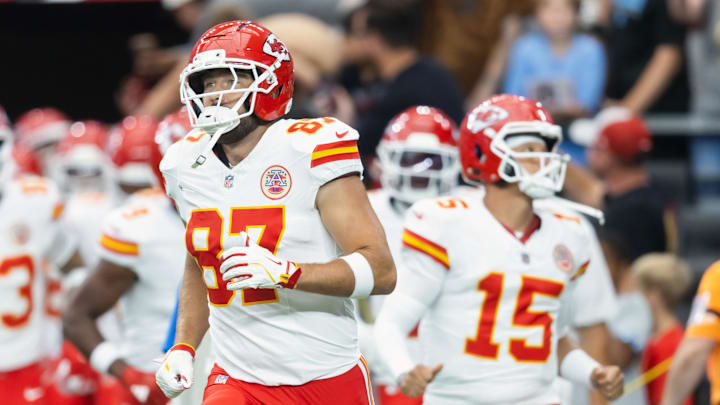 Aug 9, 2025; Glendale, Arizona, USA; Kansas City Chiefs tight end Travis Kelce (87) and quarterback Patrick Mahomes (15) against the Arizona Cardinals during a preseason NFL game at State Farm Stadium. Mandatory Credit: Mark J. Rebilas-Imagn Images