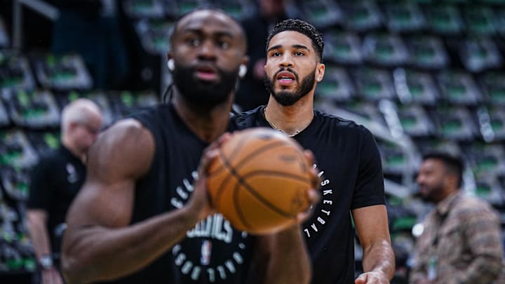 Jan 10, 2025; Boston, Massachusetts, USA; Boston Celtics forward Jayson Tatum (0) and guard Jaylen Brown (7) warm up before the start of the game against the Sacramento Kings at TD Garden. Mandatory Credit: David Butler II-Imagn Images