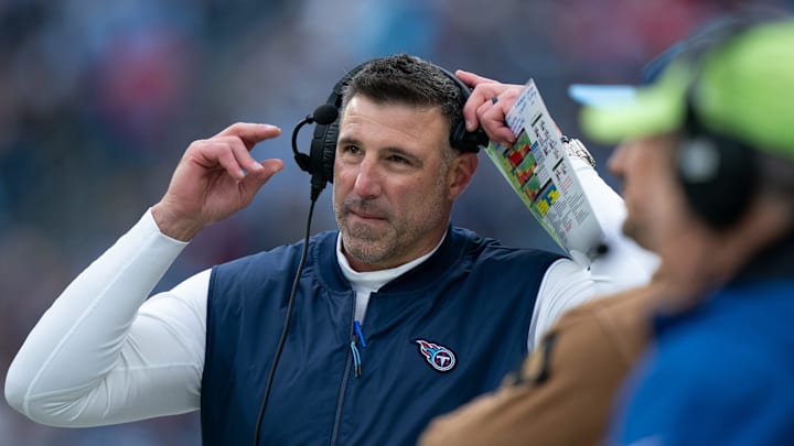 Tennessee Titans head coach Mike Vrabel pulls off his headset during their game against the Carolina Panthers at Nissan Stadium in Nashville, Tenn., Sunday, Nov. 26, 2023.