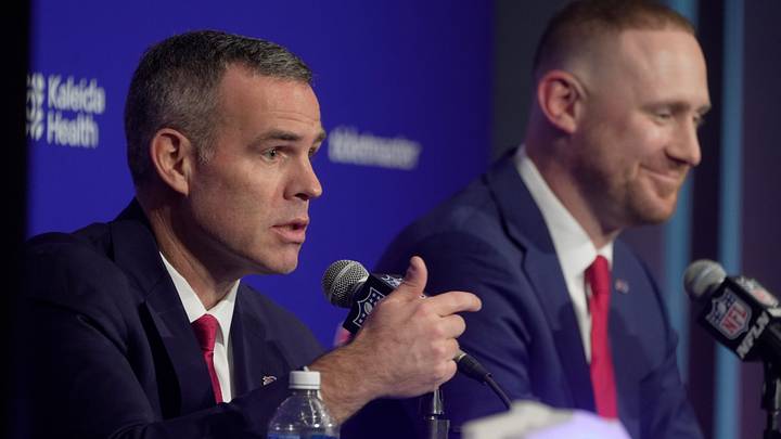 Brandon Beane, president of football operations and general manager for the Buffalo BIlls, and head coach Joe Brady take turns answering questions during a press conference that introduced Brady as the new head coach at the Bills field house in Orchard Park on Jan. 29, 2026.