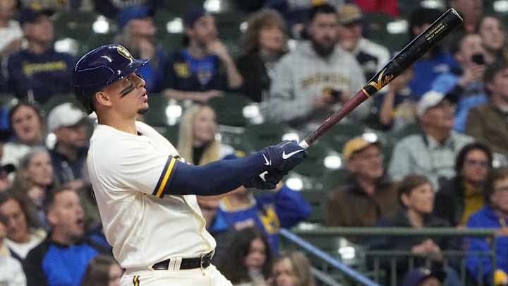 Milwaukee Brewers shortstop Willy Adames (27) hits a three-run homer during the third inning of their game against the Cincinnati Reds Tuesday, May 3, 2022 at American Family Field in Milwaukee, Wis.