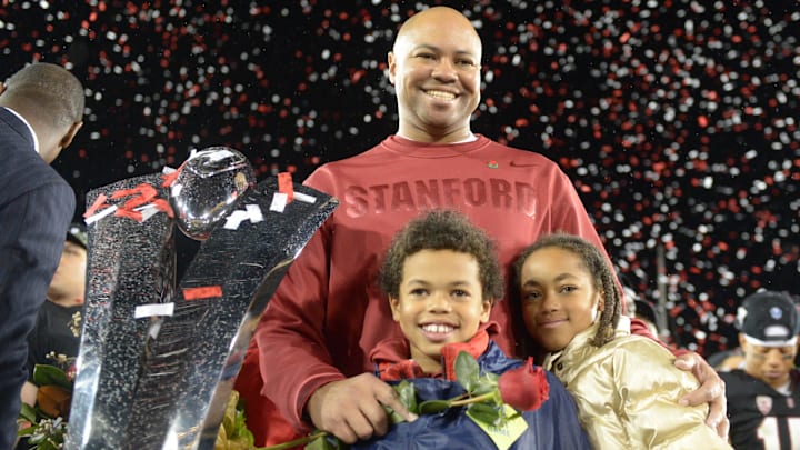 November 30, 2012; Stanford, CA, USA; Stanford Cardinal head coach David Shaw (center) poses for a photo with his children Carter Shaw (left) and Keegan Shaw (right) after the Pac-12 Championship game against the UCLA Bruins at Stanford Stadium. The Cardinal defeated the Bruins 27-24. Mandatory Credit: Kirby Lee/Image of Sport-Imagn Images