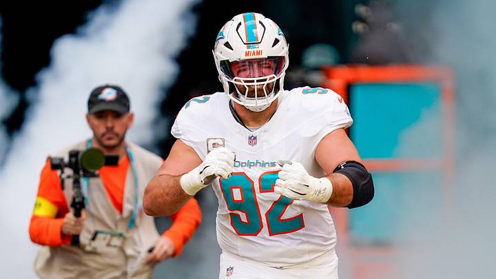 Miami Dolphins defensive tackle Zach Sieler runs on the field before a game against the Buffalo Bills at Hard Rock Stadium last season.