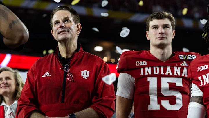 Jan 19, 2026; Miami Gardens, FL, USA; Indiana Hoosiers head coach Curt Cignetti and quarterback Fernando Mendoza (15) after defeating the Miami Hurricanes in the College Football Playoff National Championship game at Hard Rock Stadium. Mandatory Credit: Mark J. Rebilas-Imagn Images Jan 19, 2026; Miami Gardens, FL, USA; Indiana Hoosiers head coach Curt Cignetti and quarterback Fernando Mendoza (15) after defeating the Miami Hurricanes in the College Football Playoff National Championship game at Hard Rock Stadium. Mandatory Credit: Mark J. Rebilas-Imagn Images