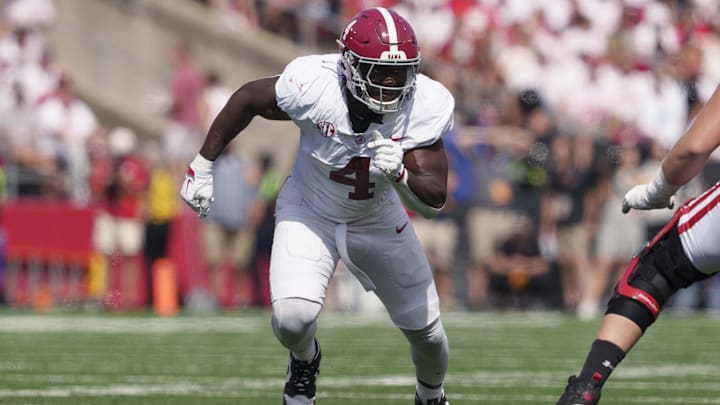 Sep 14, 2024; Madison, Wisconsin, USA; Alabama Crimson Tide linebacker Qua Russaw (4) during the game against the Wisconsin Badgers at Camp Randall Stadium. Mandatory Credit: Jeff Hanisch-Imagn Images Sep 14, 2024; Madison, Wisconsin, USA; Alabama Crimson Tide linebacker Qua Russaw (4) during the game against the Wisconsin Badgers at Camp Randall Stadium. Mandatory Credit: Jeff Hanisch-Imagn Images