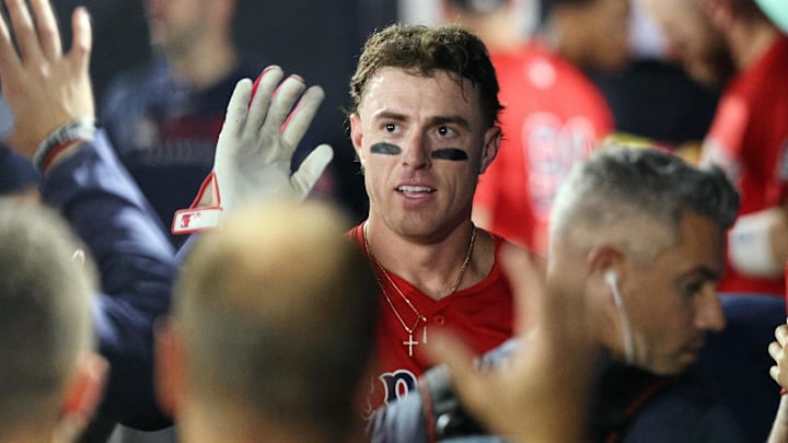 Sep 19, 2025; Tampa, Florida, USA;  Boston Red Sox second baseman Romy Gonzalez (23) is congratulated in the dugout after scoring during the eighth inning against the Tampa Bay Rays at George M. Steinbrenner Field. Mandatory Credit: Kim Klement Neitzel-Imagn Images