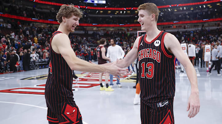Oct 31, 2025; Chicago, Illinois, USA; Chicago Bulls forward Matas Buzelis (14) celebrates with guard Kevin Huerter (13) after team's win against the New York Knicks at United Center. Mandatory Credit: Kamil Krzaczynski-Imagn Images