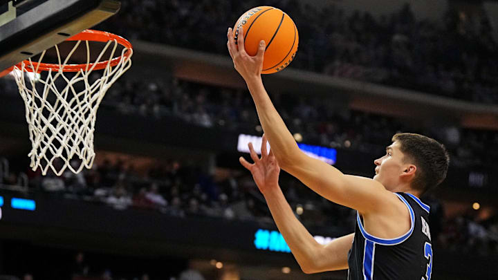 Mar 27, 2025; Newark, NJ, USA; Brigham Young Cougars guard Egor Demin (3) shoots the ball during the second half against the Alabama Crimson Tide during an East Regional semifinal of the 2025 NCAA tournament at Prudential Center.