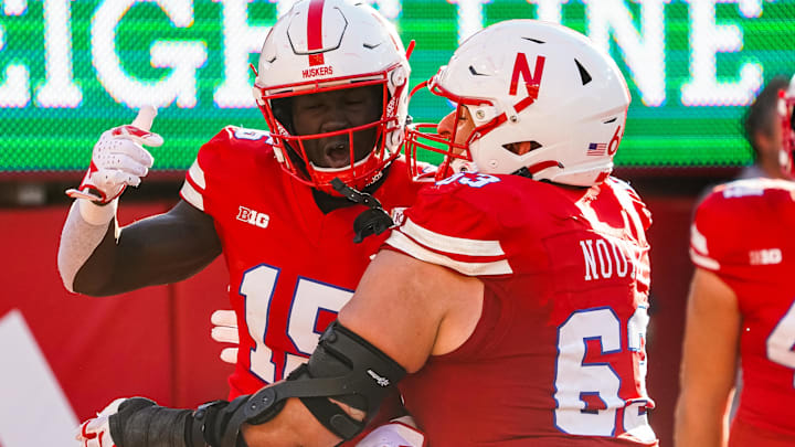 Oct 21, 2023; Lincoln, Nebraska, USA; Nebraska Cornhuskers wide receiver Malachi Coleman (left) and offensive lineman Nouredin Nouili celebrate after a touchdown by Coleman against the Northwestern Wildcats.