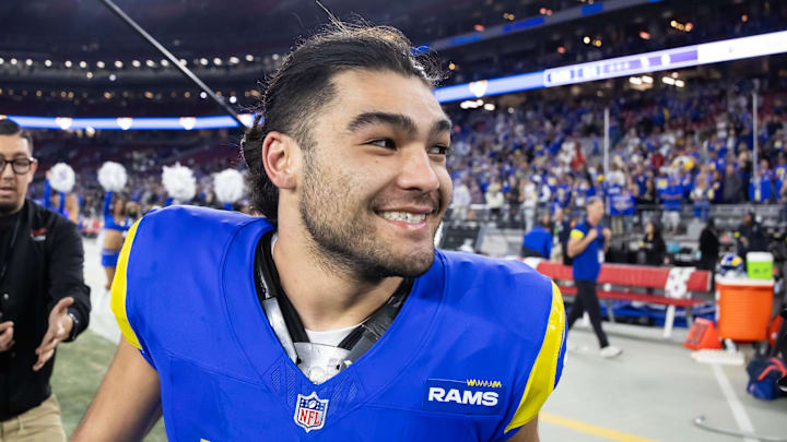 Jan 13, 2025; Glendale, AZ, USA; Los Angeles Rams wide receiver Puka Nacua (17) celebrates after defeating the Minnesota Vikings during an NFC wild card game at State Farm Stadium. Mandatory Credit: Mark J. Rebilas-Imagn Images Jan 13, 2025; Glendale, AZ, USA; Los Angeles Rams wide receiver Puka Nacua (17) celebrates after defeating the Minnesota Vikings during an NFC wild card game at State Farm Stadium. Mandatory Credit: Mark J. Rebilas-Imagn Images