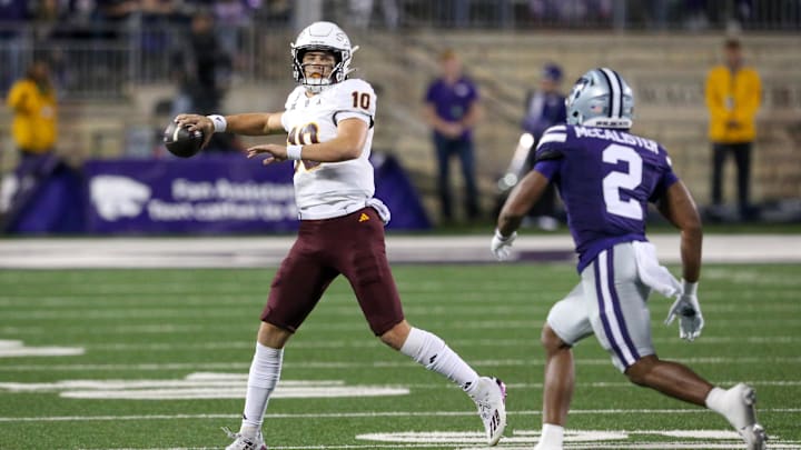 Nov 16, 2024; Manhattan, Kansas, USA; Arizona State Sun Devils quarterback Sam Leavitt (10) drops back to pass against Kansas State Wildcats safety Colby McCalister (2) during the second quarter at Bill Snyder Family Football Stadium. Mandatory Credit: Scott Sewell-Imagn Images