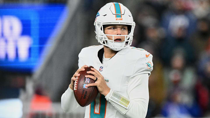 Miami Dolphins quarterback Zach Wilson (0) looks to throw a pass against the New England Patriots during the fourth quarter at Gillette Stadium.
