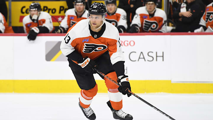 Sep 26, 2024; Philadelphia, Pennsylvania, USA; Philadelphia Flyers defenseman Adam Ginning (13) during the first period against the New York Islanders at Wells Fargo Center. 