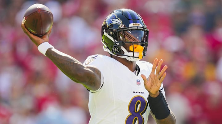 Sep 28, 2025; Kansas City, Missouri, USA; Baltimore Ravens quarterback Lamar Jackson (8) throws a pass during the first half against the Kansas City Chiefs at GEHA Field at Arrowhead Stadium. 