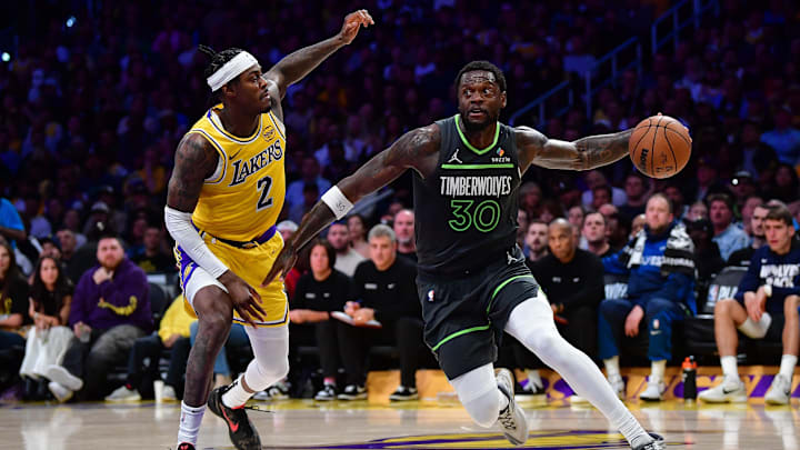 Apr 30, 2025; Los Angeles, California, USA; Minnesota Timberwolves forward Julius Randle (30) moves the ball against Los Angeles Lakers forward Jarred Vanderbilt (2) during the second half in game five of first round for the 2025 NBA Playoffs at Crypto.com Arena. Mandatory Credit: Gary A. Vasquez-Imagn Images Apr 30, 2025; Los Angeles, California, USA; Minnesota Timberwolves forward Julius Randle (30) moves the ball against Los Angeles Lakers forward Jarred Vanderbilt (2) during the second half in game five of first round for the 2025 NBA Playoffs at Crypto.com Arena. Mandatory Credit: Gary A. Vasquez-Imagn Images