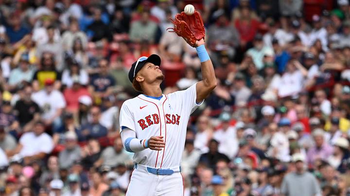 Jun 15, 2025; Boston, Massachusetts, USA; Boston Red Sox second baseman Kristian Campbell (28) makes a catch for an out against the New York Yankees during the seventh inning at Fenway Park. Mandatory Credit: Eric Canha-Imagn Images