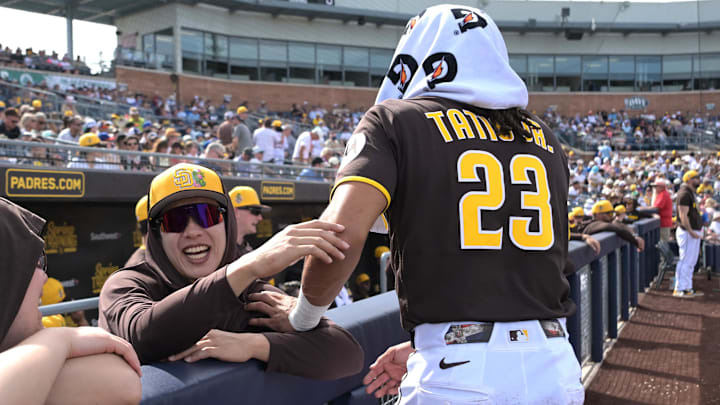 Feb 23, 2026; Peoria, Arizona, USA; San Diego Padres third baseman Sung-Mun Song (24) and San Diego Padres right fielder Fernando Tatis Jr. (23) share a laugh in the dugout during the game against the Milwaukee Brewers at Peoria Sports Complex. Mandatory Credit: Jayne Kamin-Oncea-Imagn Images Feb 23, 2026; Peoria, Arizona, USA; San Diego Padres third baseman Sung-Mun Song (24) and San Diego Padres right fielder Fernando Tatis Jr. (23) share a laugh in the dugout during the game against the Milwaukee Brewers at Peoria Sports Complex. Mandatory Credit: Jayne Kamin-Oncea-Imagn Images