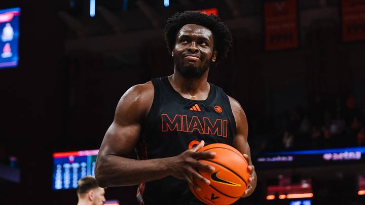 Feb 21, 2026; Charlottesville, Virginia, USA; Miami (FL) Hurricanes center Ernest Udeh Jr. (8) reacts after a play in the second half against the Virginia Cavaliers at John Paul Jones Arena. Mandatory Credit: Emily Faith Morgan-Imagn Images