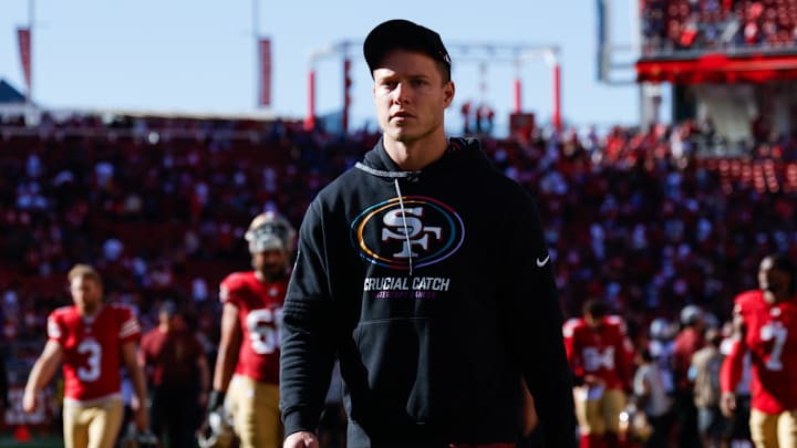 Sep 29, 2024; Santa Clara, California, USA; San Francisco 49ers running back Christian McCaffrey (23) walks off the field after the game against the New England Patriots at Levi's Stadium. Mandatory Credit: Sergio Estrada-Imagn Images