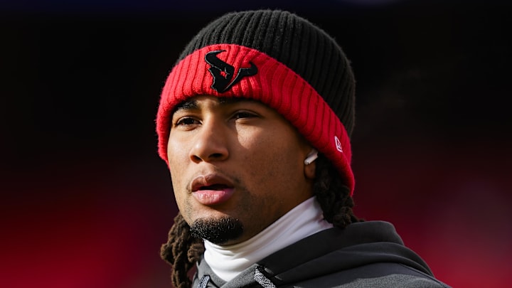 Jan 18, 2025; Kansas City, Missouri, USA; Houston Texans quarterback C.J. Stroud (7) warms up prior to a 2025 AFC divisional round game against the Kansas City Chiefs at GEHA Field at Arrowhead Stadium. Mandatory Credit: Jay Biggerstaff-Imagn Images