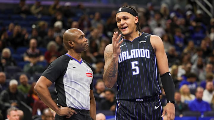 Orlando Magic forward Paolo Banchero (5) talks with referee Courtney Kirkland (61) during the game against the Portland Trail Blazers at Kia Center. Orlando Magic forward Paolo Banchero (5) talks with referee Courtney Kirkland (61) during the game against the Portland Trail Blazers at Kia Center.