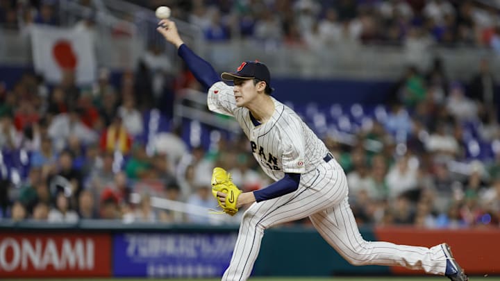 Mar 20, 2023; Miami, Florida, USA; Japan starting pitcher Roki Sasaki (14) delivers a pitch during the first inning against Mexico at LoanDepot Park. Mar 20, 2023; Miami, Florida, USA; Japan starting pitcher Roki Sasaki (14) delivers a pitch during the first inning against Mexico at LoanDepot Park.