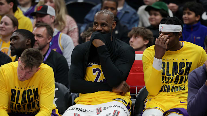 Los Angeles Lakers forward LeBron James (23) laughs on the bench during the second half against the Utah Jazz at Delta Center.