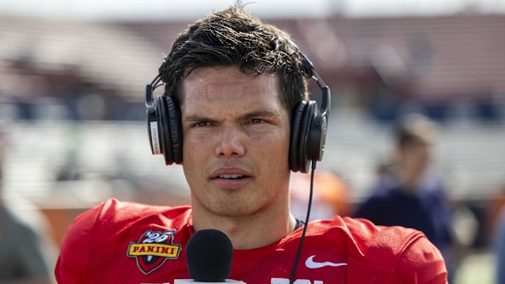 Jan 29, 2025; Mobile, AL, USA; National team quarterback Dillon Gabriel of Oregon (8) talks with media members after Senior Bowl practice at Hancock Whitney Stadium. Mandatory Credit: Vasha Hunt-Imagn Images