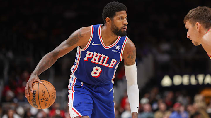 Oct 14, 2024; Atlanta, Georgia, USA; Philadelphia 76ers forward Paul George (8) dribbles against the Atlanta Hawks in the second quarter at State Farm Arena. Mandatory Credit: Brett Davis-Imagn Images