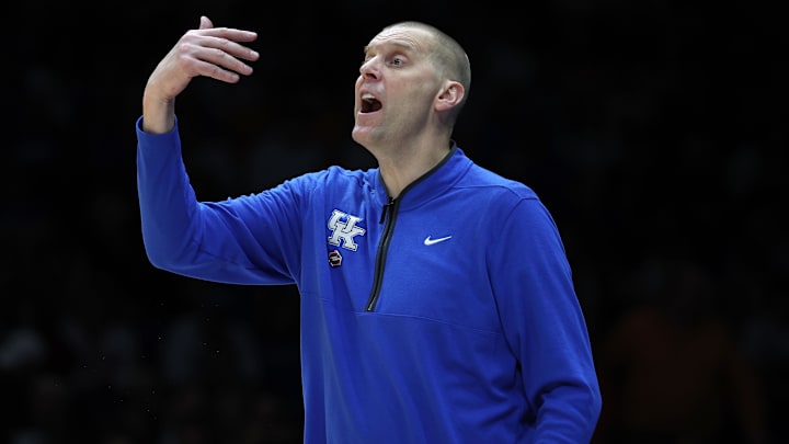 Mar 28, 2025; Indianapolis, IN, USA; Kentucky Wildcats head coach Mark Pope reacts in the second half during a Midwest Regional semifinal of the 2025 NCAA tournament at Lucas Oil Stadium. Mandatory Credit: Trevor Ruszkowski-Imagn Images Mar 28, 2025; Indianapolis, IN, USA; Kentucky Wildcats head coach Mark Pope reacts in the second half during a Midwest Regional semifinal of the 2025 NCAA tournament at Lucas Oil Stadium. Mandatory Credit: Trevor Ruszkowski-Imagn Images
