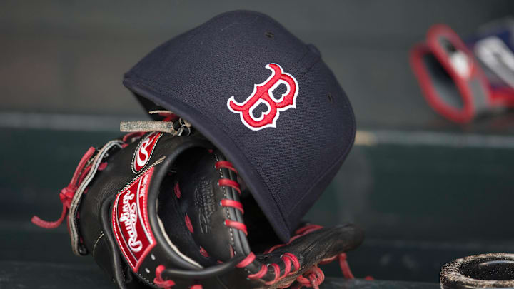 May 14, 2014; Minneapolis, MN, USA; A general view of a glove and Boston Red Sox hat in the dugout prior to a game between the Boston Red Sox and Minnesota Twins at Target Field. Mandatory Credit: Jesse Johnson-Imagn Images May 14, 2014; Minneapolis, MN, USA; A general view of a glove and Boston Red Sox hat in the dugout prior to a game between the Boston Red Sox and Minnesota Twins at Target Field. Mandatory Credit: Jesse Johnson-Imagn Images