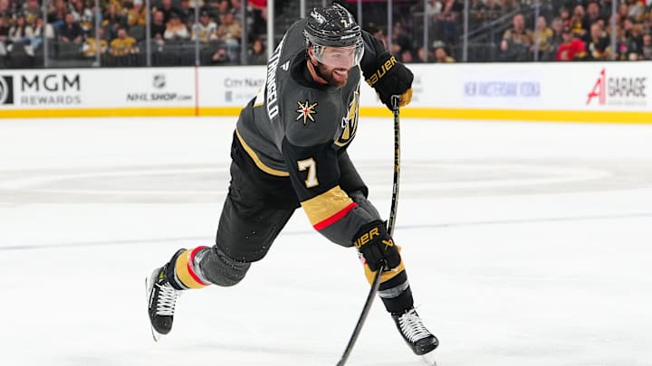 Mar 23, 2025; Las Vegas, Nevada, USA; Vegas Golden Knights defenseman Alex Pietrangelo (7) shoots against the Tampa Bay Lightning during the second period at T-Mobile Arena. Mandatory Credit: Stephen R. Sylvanie-Imagn Images