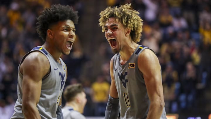Mar 7, 2020; Morgantown, West Virginia, USA; West Virginia Mountaineers guard Miles McBride (4) and forward Emmitt Matthews Jr. (11) celebrate after a play during the second half against the Baylor Bears at WVU Coliseum. Mandatory Credit: Ben Queen-Imagn Images Mar 7, 2020; Morgantown, West Virginia, USA; West Virginia Mountaineers guard Miles McBride (4) and forward Emmitt Matthews Jr. (11) celebrate after a play during the second half against the Baylor Bears at WVU Coliseum. Mandatory Credit: Ben Queen-Imagn Images