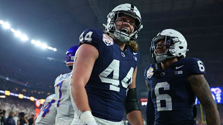 Dec 31, 2024; Glendale, AZ, USA; Penn State Nittany Lions tight end Tyler Warren (44) reacts with wide receiver Harrison Wallace III (6) after scoring a touchdown against the Boise State Broncos during the first half in the Fiesta Bowl at State Farm Stadium. Mandatory Credit: Mark J. Rebilas-Imagn Images Dec 31, 2024; Glendale, AZ, USA; Penn State Nittany Lions tight end Tyler Warren (44) reacts with wide receiver Harrison Wallace III (6) after scoring a touchdown against the Boise State Broncos during the first half in the Fiesta Bowl at State Farm Stadium. Mandatory Credit: Mark J. Rebilas-Imagn Images