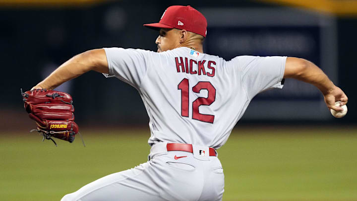 iJul 24, 2023; Phoenix, Arizona, USA; St. Louis Cardinals relief pitcher Jordan Hicks (12) pitches